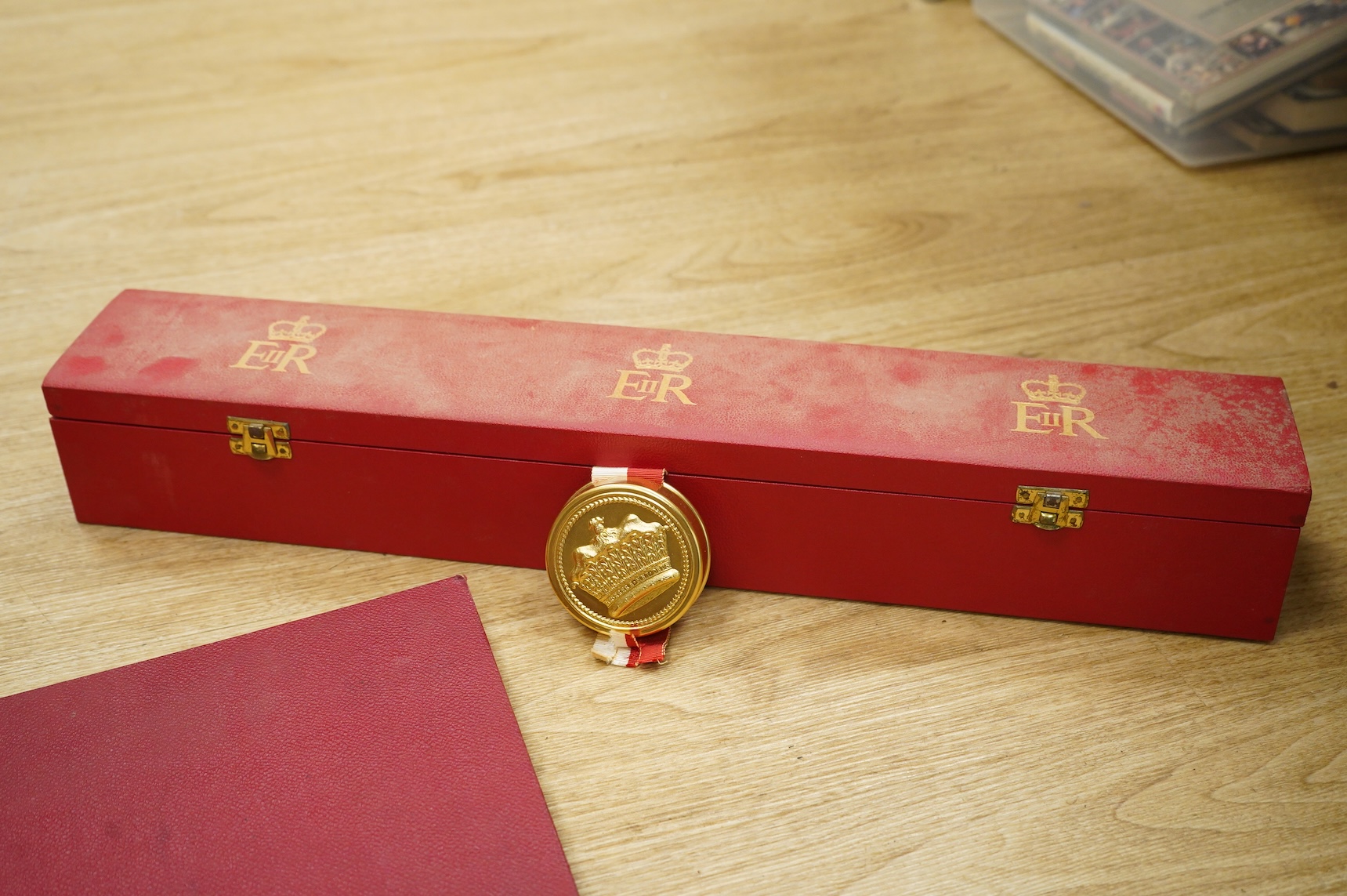 Two EIIR cased grant of arms to Peter Bickersteth and Peter Bickerstaff-Earnshaw together with a book on the pedigree of Bickersteth inscribed to Robert Alexander Bickersteth, 4 Rodney Street Liverpool